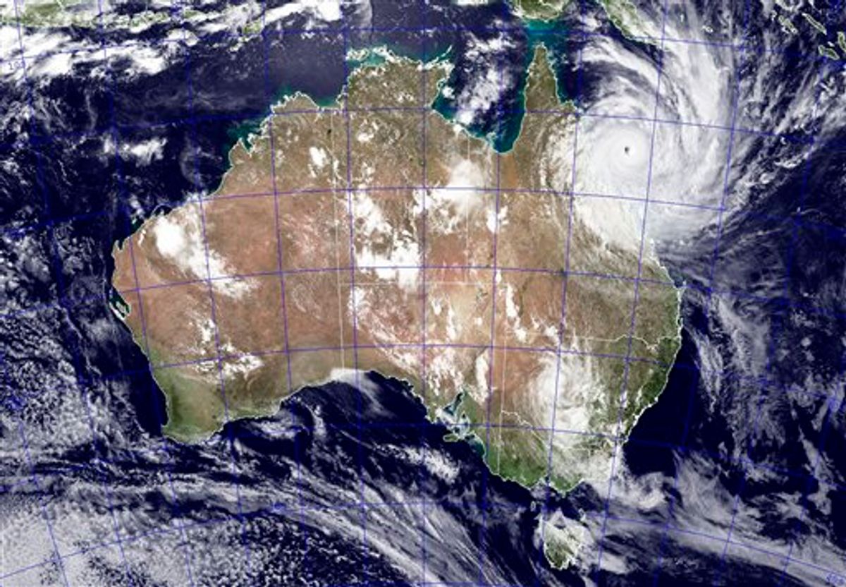 This image provided by NASA shows Tropical Cyclone Yasi as it approaches Queensland, Australia, Wednesday Feb. 2, 2011. This NEXSAT image captured this natural-color image at 04:32 GMT Wednesday Feb. 2, 2011. The Category 5 storm is expected to make landfall at approximately noon GMT Wednesday. Gusts up to 186 mph (300 kph) were expected when Cyclone Yasi strikes the Australian coast Wednesday after whipping across Australia's Great Barrier Reef. The storm front is more than 310 miles (500 kilometers) wide and Yasi is so strong, it could reach far inland before it significantly loses power. (AP Photo/NASA - Jeff Schmaltz) (AP)