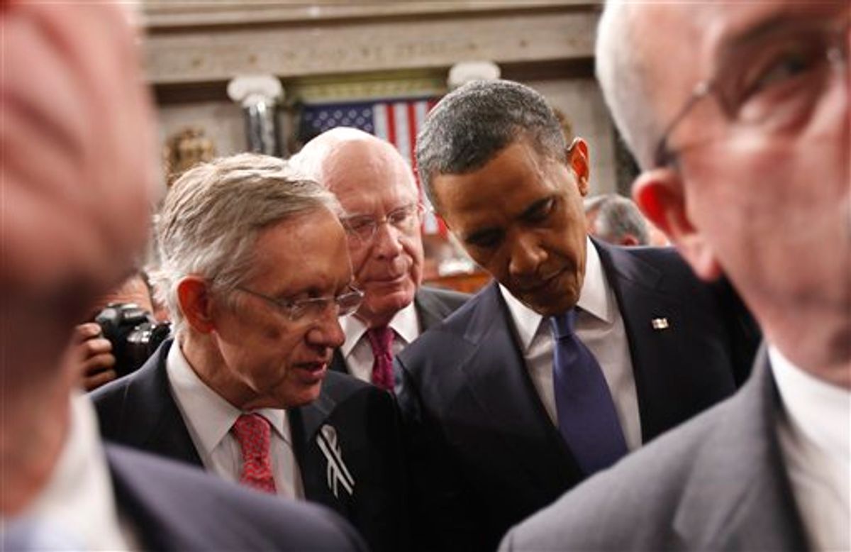President Barack Obama talks with Senate Majority Leader Harry Reid of Nev., left, and Sen. Patrick Leahy, D-Vt., on Capitol Hill in Washington, Tuesday, Jan. 25, 2011, after delivering his State of the Union address.  (AP Photo/Pablo Martinez Monsivais, Pool)     (AP)
