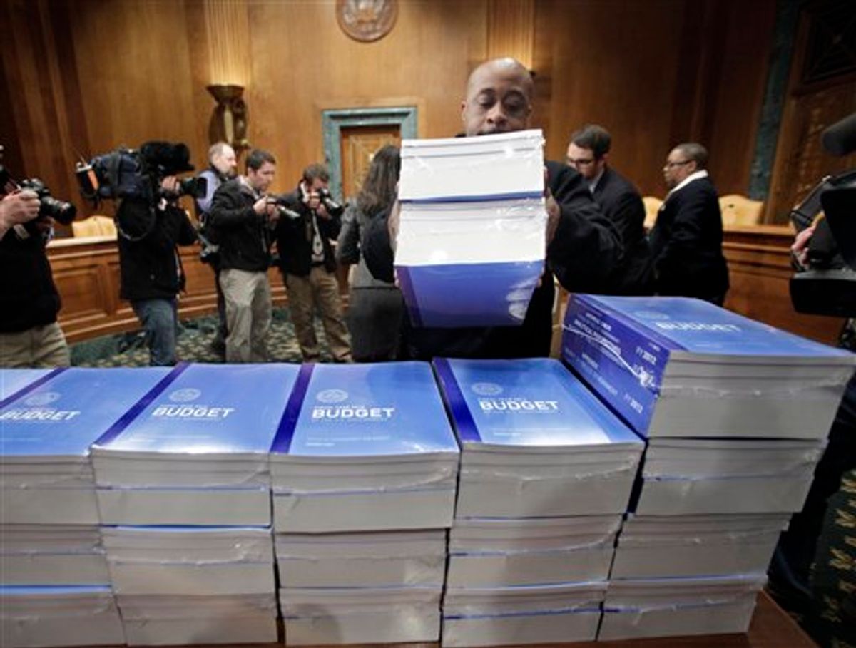 Copies of President Obama's 2012 budget are delivered to the Senate Budget Committee, Monday, Feb. 14, 2011, on Capitol Hill in Washington.  (AP Photo/J. Scott Applewhite) (AP)