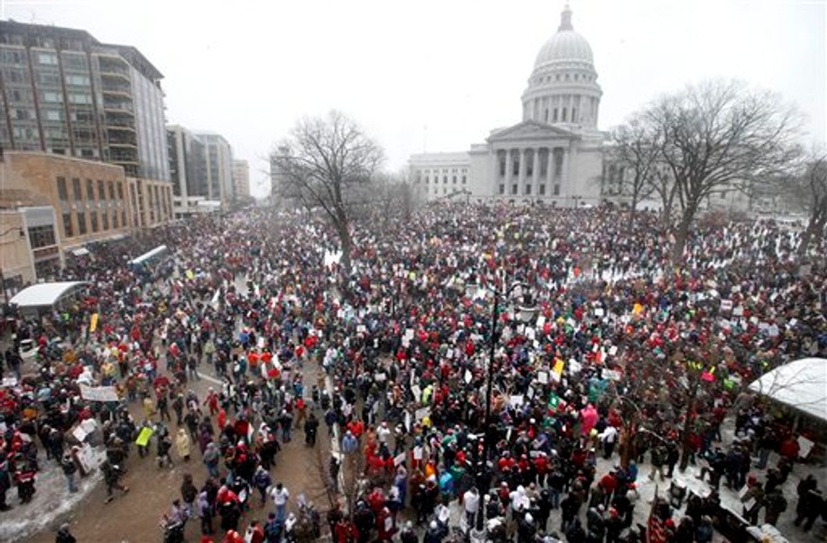 Thousands of opponents of Wisconsin Wisconsin Governor Scott Walker's budget repair bill gather for protests at the Wisconsin State Capitol in Madison, Wisconsin Saturday, February 26, 2011. (AP Photo/Wisconsin State Journal, John Hart) (AP)