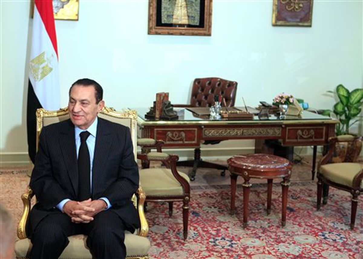 File - Egyptian President Hosni Mubarak looks on at his office as he meets with Russian Deputy Foreign Minister Alexander Saltanov, not pictured, at the Presidential palace in Cairo, Egypt, in this Wednesday, Feb.9, 2011 file picture.  Switzerland has frozen whatever assets Hosni Mubarak and his associates may have there, and anti-corruption campaigners demand the same of other countries. But experts say hunting for the deposed Egyptian leader's purported hidden wealth _ let alone recovering it _ will be a task of epic proportions that could involve cracking through a wall of front companies. (AP Photo/Amr Nabil, file)   (AP)