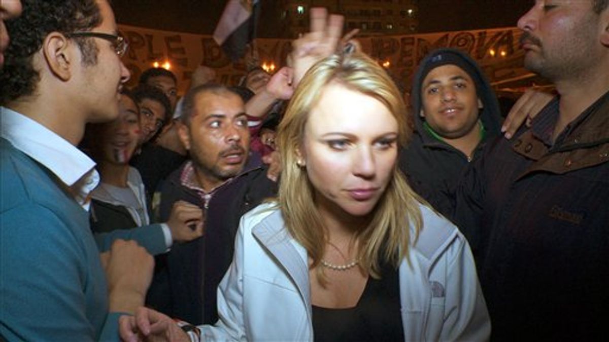 In this Feb. 11, 2011 photo released by CBS, "60 Minutes" correspondent Lara Logan is shown covering the reaction in in Cairo's Tahrir Square the day Egyptian President Hosni Mubarak stepped down.  CBS News says Logan was attacked Friday, and suffered a brutal beating and sexual assault before being saved by a group of women and an estimated 20 Egyptian soldiers. She is recovering in a U.S. hospital. Logan, CBS News' chief foreign affairs correspondent, is one of at least 140 correspondents who have been injured or killed since Jan. 30 while covering the unrest in Egypt, according to the Committee to Protect Journalists.  (AP Photo/CBS News)   (AP)