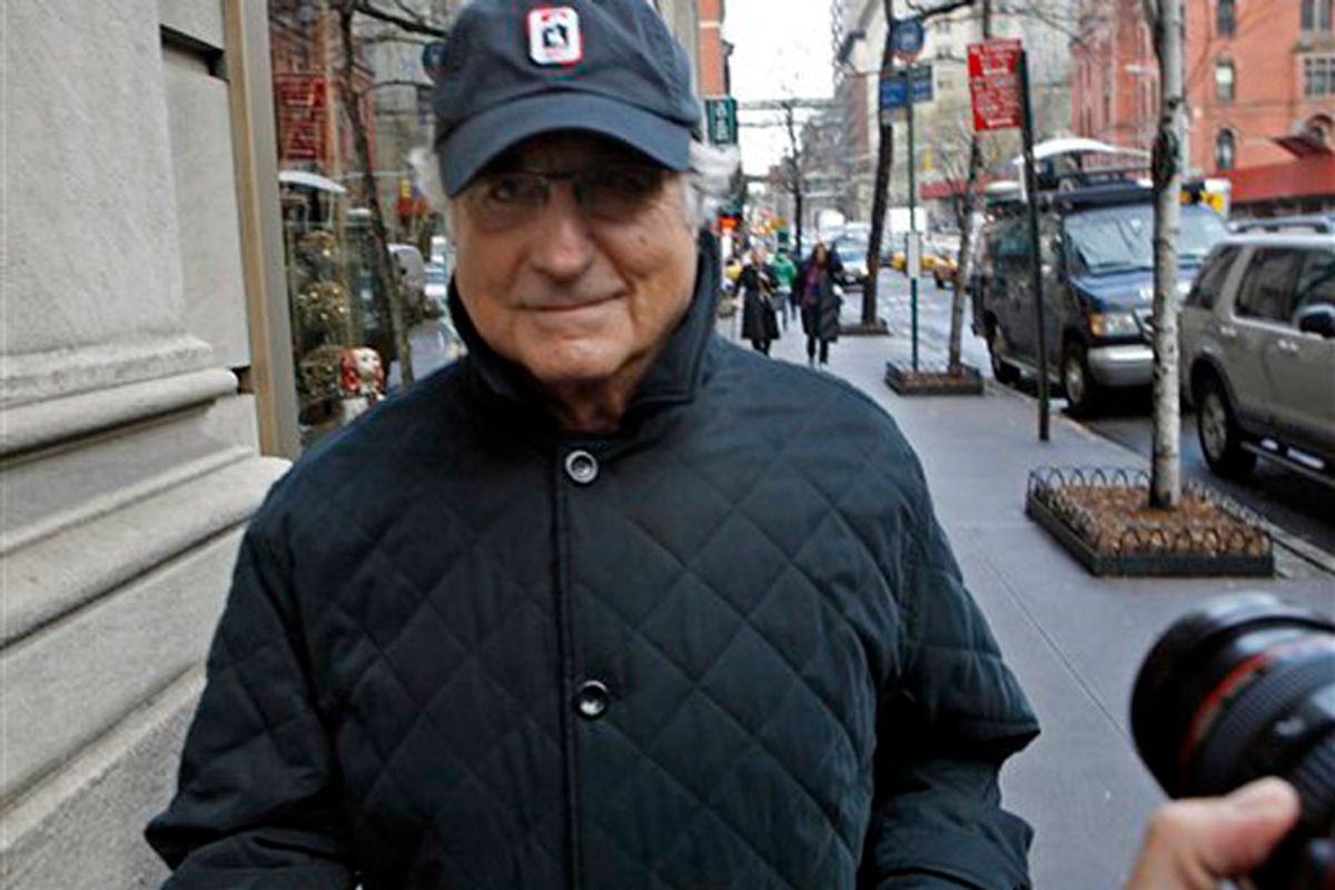 Bernard Madoff, chairman of Madoff Investment Securities, returns to his Manhattan apartment after making a court appearance Wednesday, Dec. 17, 2008 in New York.  The judge in Madoff's fraud case has set new conditions for his bail, including a curfew and ankle-monitoring bracelet for the disgraced investor. (AP Photo/Jason DeCrow)    (Jason Decrow)
