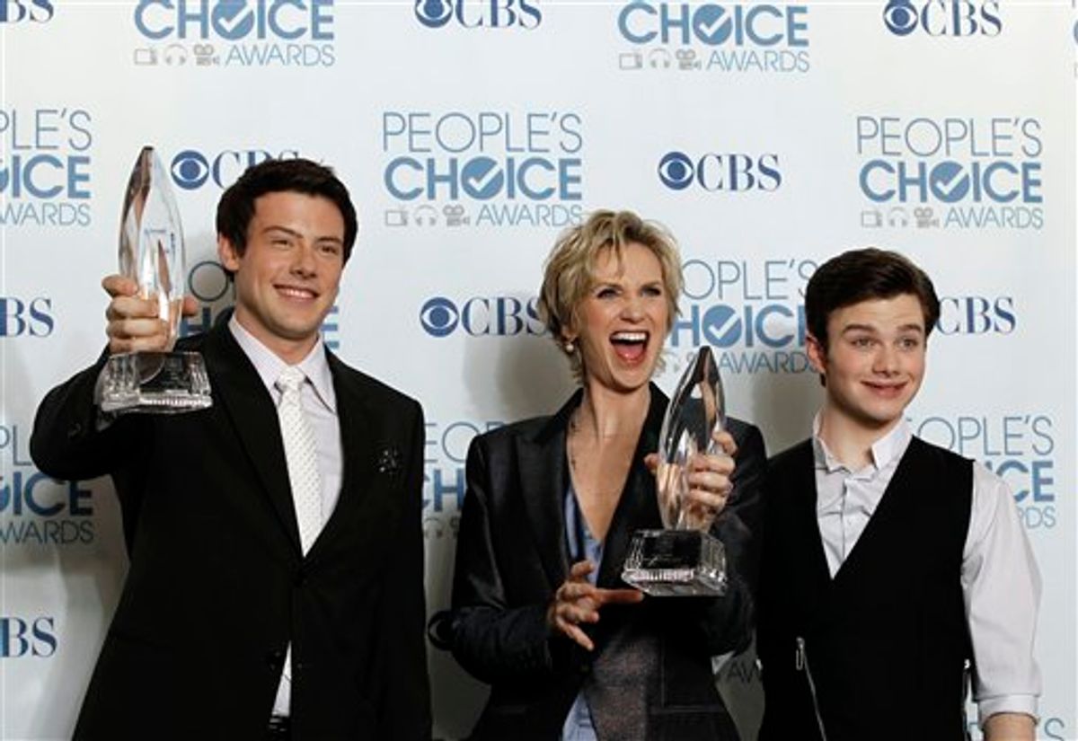 From left, Cory Monteith, Jane Lynch, and Chris Colfer pose for a photo backstage with the award for favorite TV comedy for "Glee" at the People's Choice Awards on Wednesday, Jan. 5, 2011, in Los Angeles. (AP Photo/Matt Sayles)    (AP)