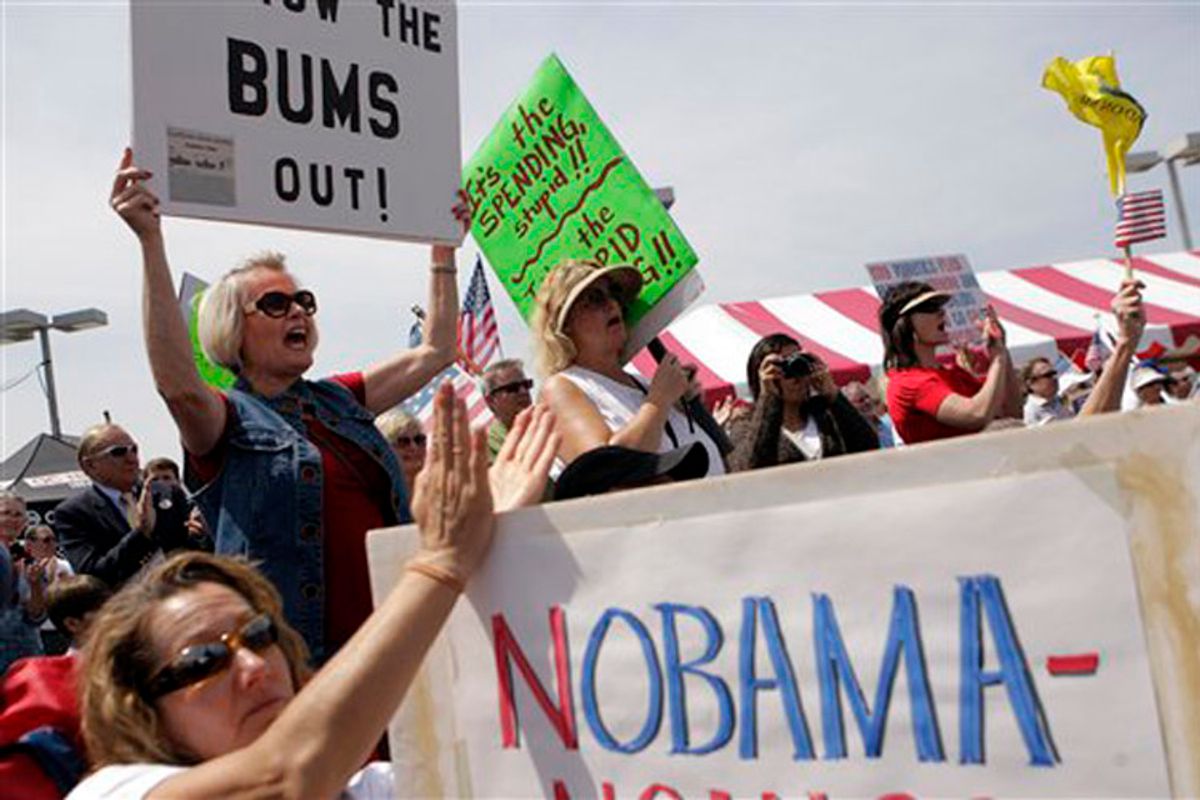 Tea party supporters cheer as they listen to a speech at a tea party rally in Irvine, Calif., Thursday, April 15, 2010. (AP Photo/Jae C. Hong) (Jae C. Hong)