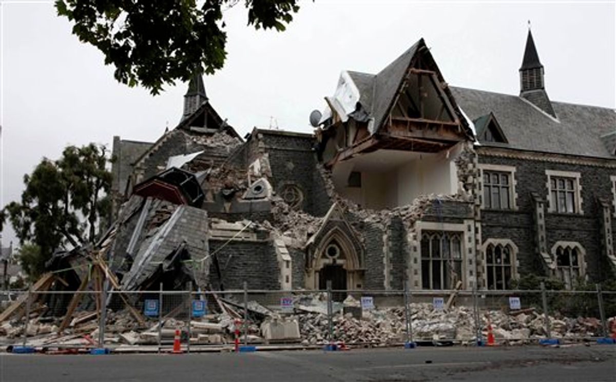 A building in Christchurch, New Zealand, is destroyed after an earthquake struck Tuesday, Feb. 22, 2011. The 6.3-magnitude quake collapsed buildings and is sending rescuers scrambling to help trapped people amid reports of multiple deaths. (AP Photo/NZPA, Pam Johnson) NEW ZEALAND OUT, NO ARCHIVES, NO SALES  (AP)