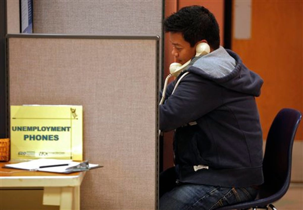In this photo taken Feb. 3, 2011, unemployed financial worker Jonathan Velazquez, phones in to get State of California's Employment Development Department,  EDD unemployment benefits at the Verdugo Job Center in Glendale, Calif. Finding a job remains a struggle 20 months after the recession technically ended. (AP Photo/Damian Dovarganes) (AP)
