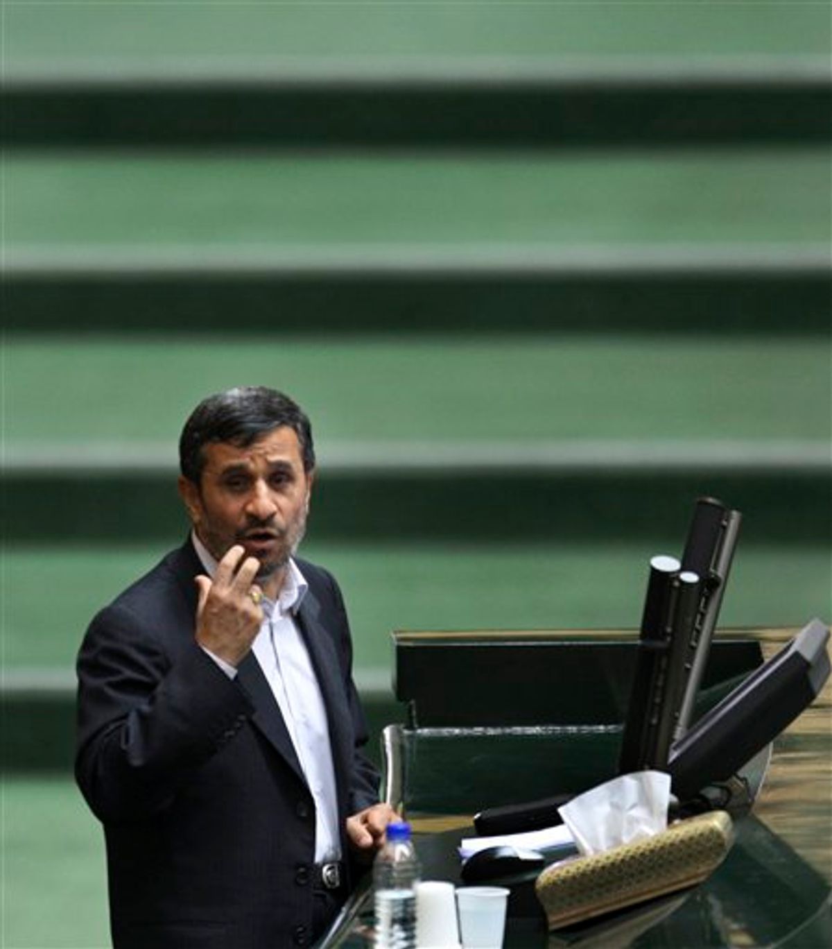 Iranian President Mahmoud Ahmadinejad delivers his speech during the debate for a vote of confidence in Ahmadinejad's choice for new Foreign Minister, who is Head of Iran's Atomic Energy Organization, Ali Akbar Salehi,  during an open session of parliament, in Tehran, Iran, Sunday, Jan. 30, 2011.  Iran's lawmakers approved Ahmadinejad's choice of Salehi for foreign minister, indicating the importance that the country's nuclear program has for its international diplomacy. (AP Photo/Vahid Salemi) (AP)