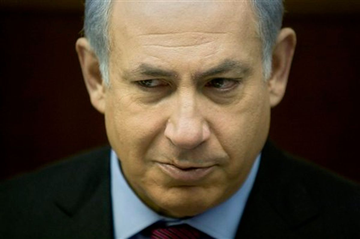 Israeli Prime Minister Benjamin Netanyahu attends the weekly cabinet meeting in his Jerusalem office, Sunday, Jan. 16, 2011. Israeli authorities said Sunday they are moving ahead with a new proposal to build 1,400 apartments in a contested part of Jerusalem, enraging Palestinians who denounced the plan as another settler land grab. (AP Photo/Sebastian Scheiner, Pool)  (AP)
