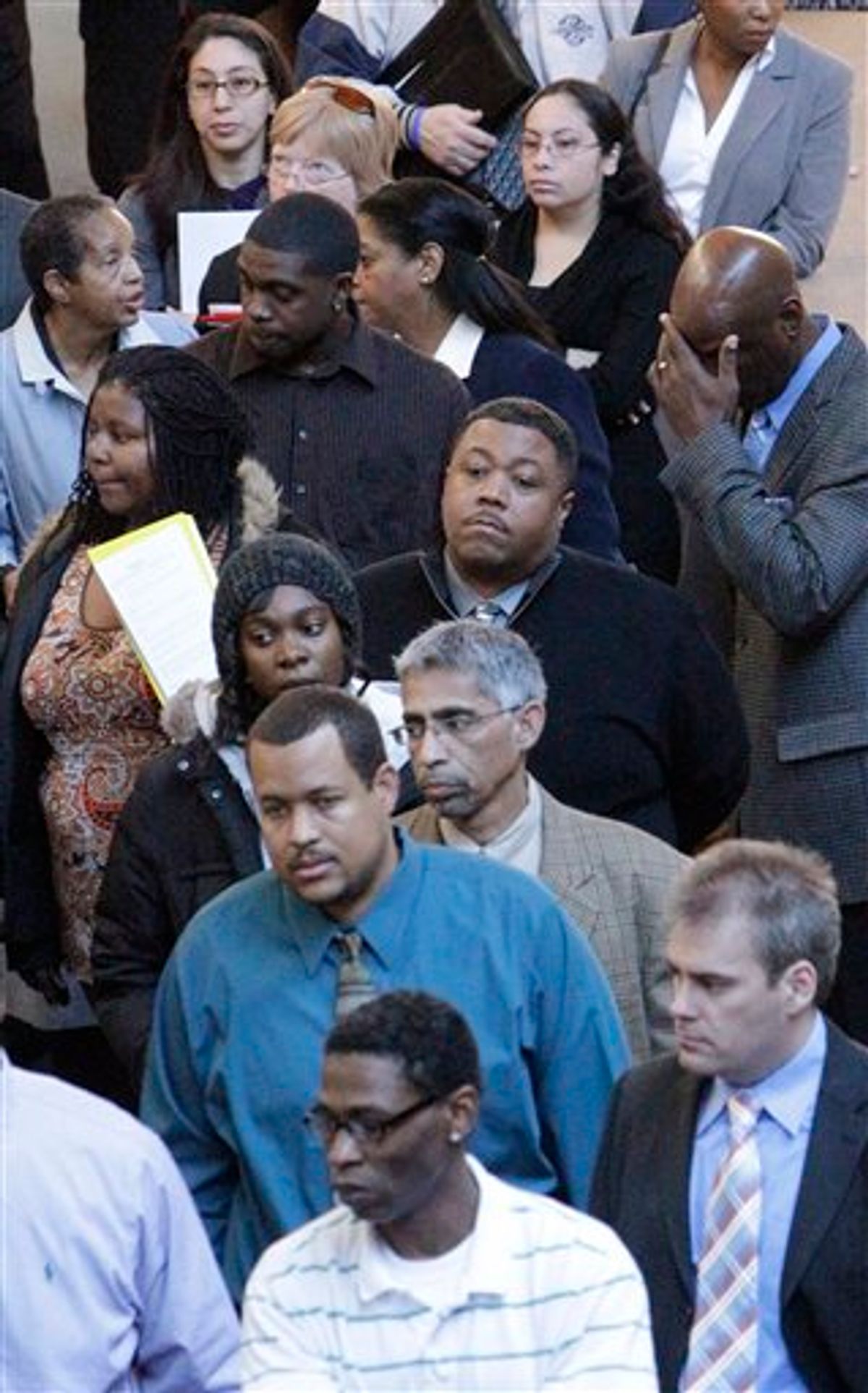 FILE - In this Jan. 26, 2011 file photo, job seekers line up for a job fair at a hotel in Dallas. The number of people applying for unemployment benefits fell last week, after bad weather contributed to a spike in the number of those seeking benefits the previous week. (AP Photo/LM Otero, file) (AP)