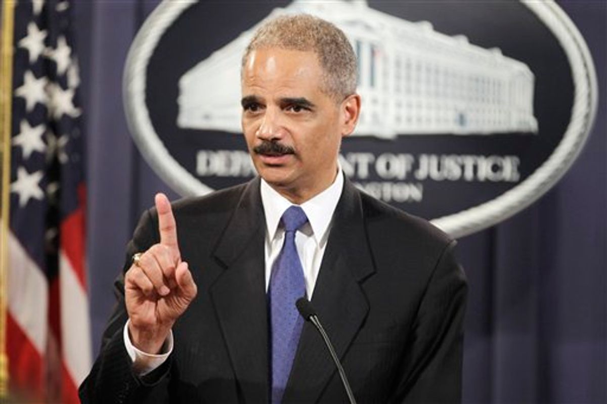 Attorney General Eric Holder answers a question about WikiLeaks during a news conference at the Justice Department in Washington, Monday, Nov. 29, 2010. (AP Photo/Charles Dharapak)    (AP)