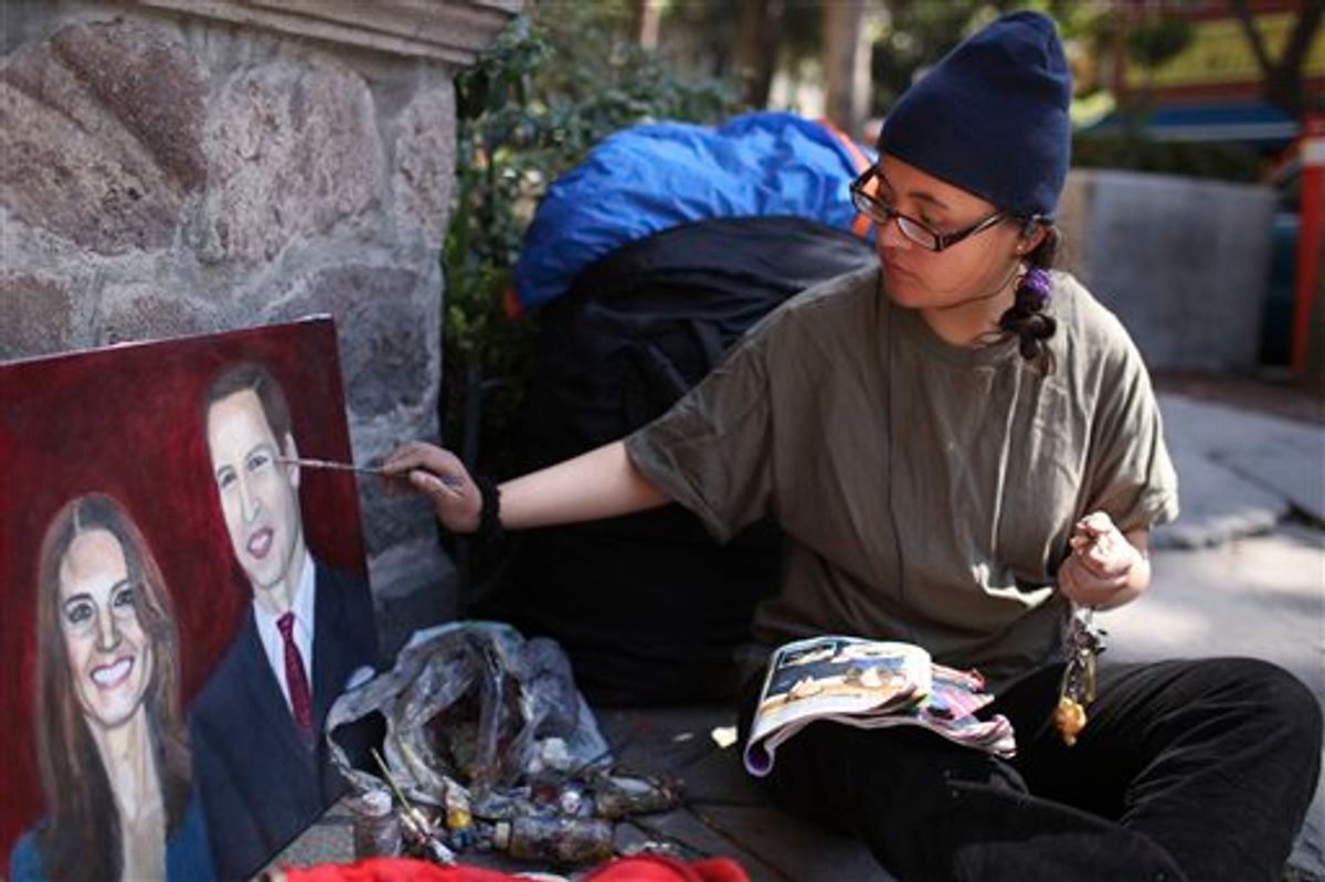 Estibalis Chavez paints a portrait of Britain's Prince William and Kate Middleton in front of the British Embassy in Mexico City, Friday Feb. 18, 2011.  Chavez, 19, who says she has a childhood dream to attend a royal wedding, claims she has been on a hunger strike for nine days and will continue her fast camped out in front of the embassy until she gets an invitation to attend the royal wedding of William and Kate.  According to a statement from the British embassy in Mexico, Buckingham Palace is aware of Chavez's hunger strike but no invitation will be extended to her. (AP Photo/Alexandre Meneghini)  (AP)