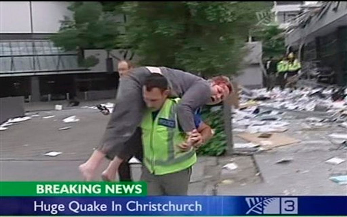 In this image made from video run by New Zealand's TV3, an injured person is carried on a street in Christchurch, New Zealand Tuesday, Feb. 22, 2011 after a 6.3-magnitude earthquake rocked the city. (AP Photo/TV3 via Associated Press Television News) NEW ZEALAND OUT, TV OUT  (AP)