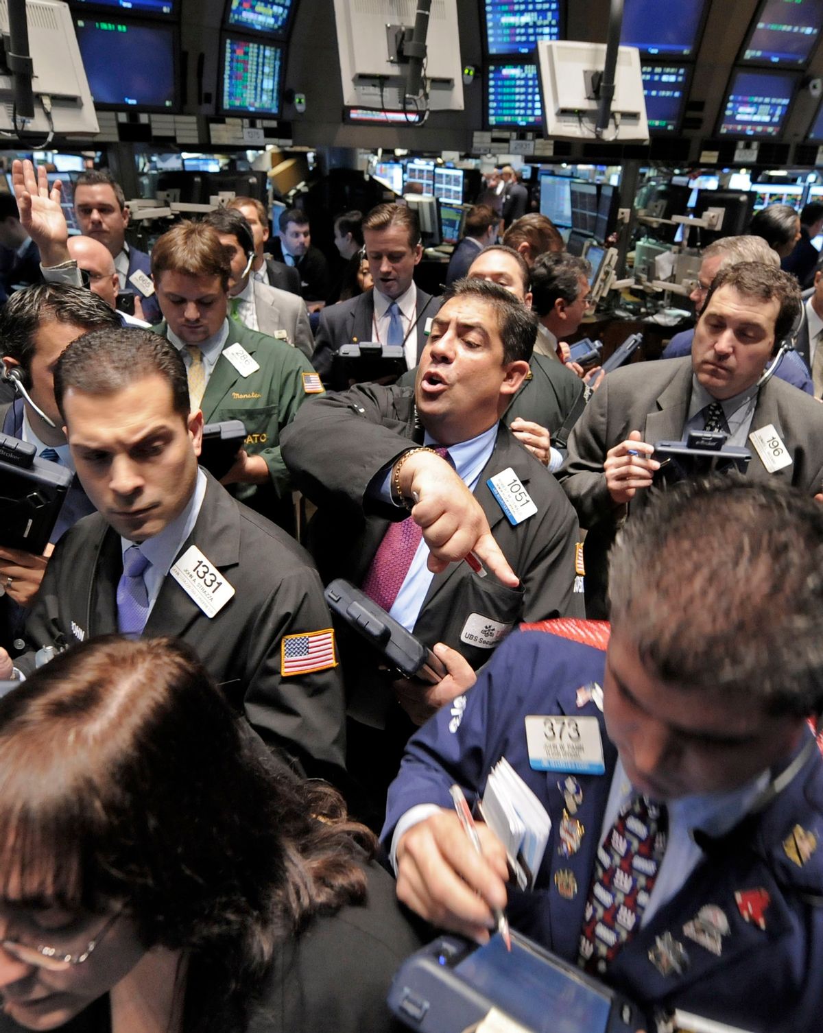Traders gather at the post that handles General Motors on the floor of the New York Stock Exchange Friday, Nov. 7, 2008. (AP Photo/Richard Drew) (AP)
