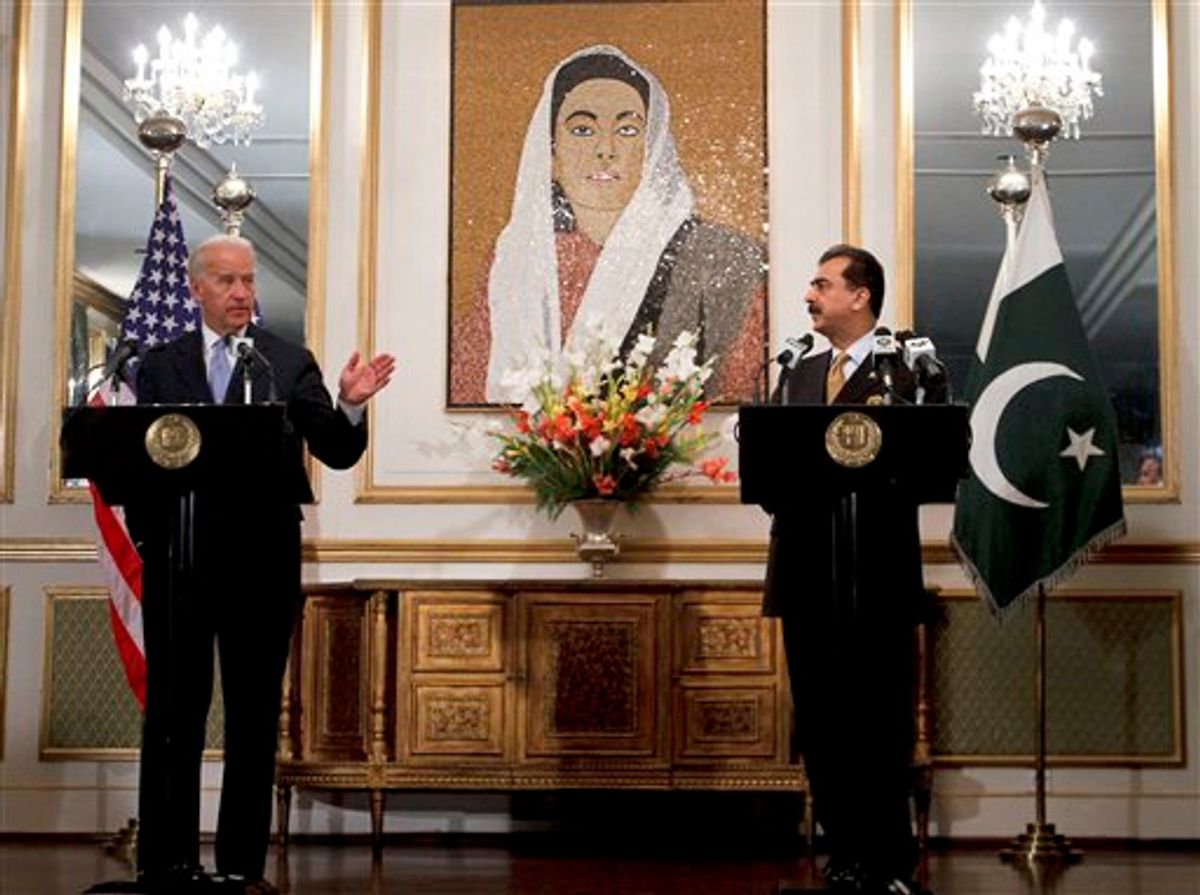 U.S. Vice President Joe Biden, left, gestures as Pakistani Prime Minister Yusuf Raza Gilani, right, looks on during a joint press conference at Prime Minister's residence in Islamabad, Pakistan on Wednesday, Jan. 12, 2011. Biden met with Pakistan leaders as part of American efforts to get Islamabad to intensify the fight against Islamist militants sheltering along the Afghan border. (AP Photo/Anjum Naveed)  (AP)