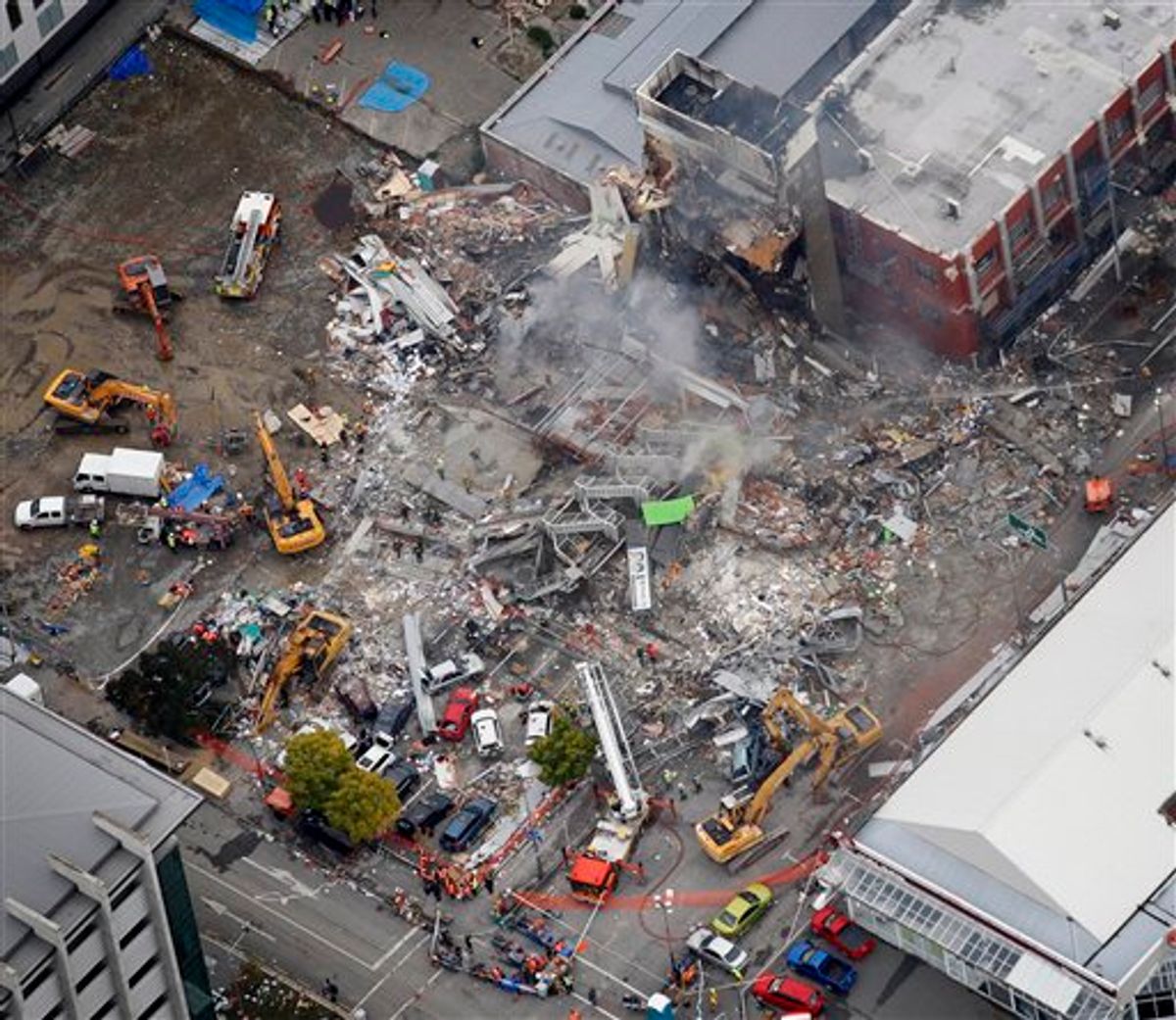 An aerial view of emergency services people working at the ruined CTV building in central in Christchurch, New Zealand, Wednesday, Feb. 23, 2011. Search teams used their bare hands, dogs, heavy cranes and earth movers Wednesday to pull survivors from the rubble of Tuesday's powerful earthquake. (AP Photo/Sarah Ivey) AUSTRALIA OUT, NEW ZEALAND OUT  (AP)