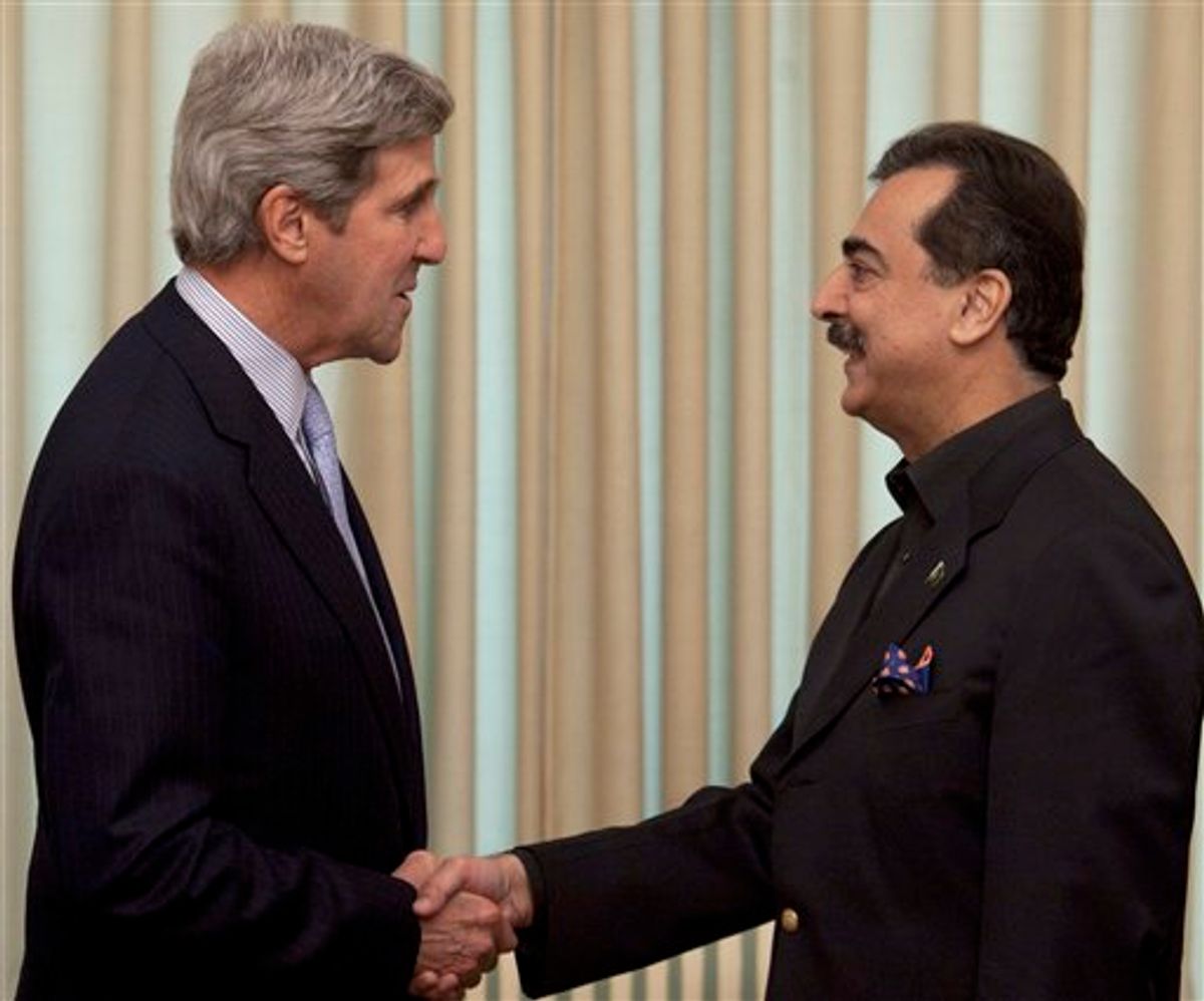 U. S. Senator John Kerry, left, meets Pakistan's Prime Minister Yousuf Raza Gilani in Islamabad, Pakistan on Wednesday, Feb. 16, 2011. Kerry's meeting with Pakistani officials is an indication that the American politician may have a rocky time convincing Pakistan to free a U. S. consulate employee Raymond Davis, allegedly involved in shooting of two Pakistanis.(AP Photo/B.K.Bangash)          (AP)