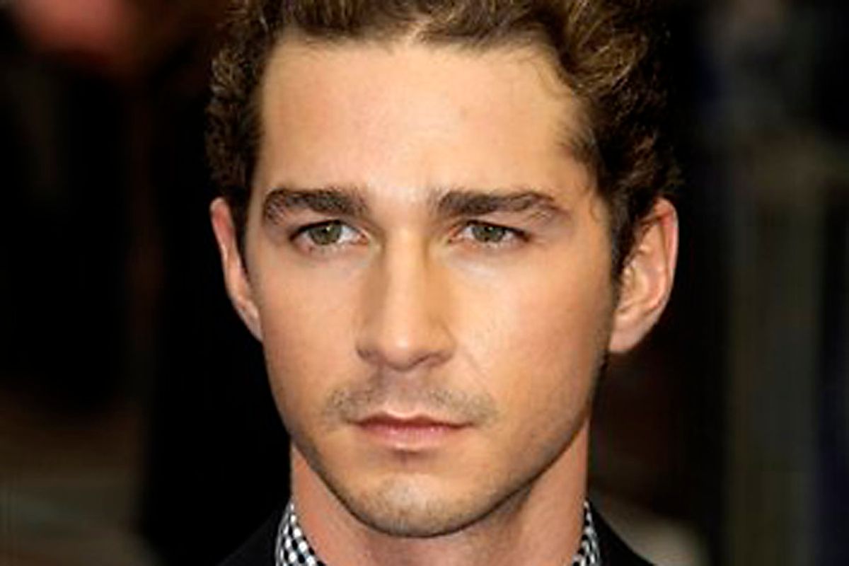 Actor Shia LaBeouf poses for photographers as he arrives for the UK premiere of the film 'Transformers: Revenge of the Fallen' at a cinema in London, Monday June 15, 2009.  (AP Photo/Matt Dunham) (Matt Dunham)