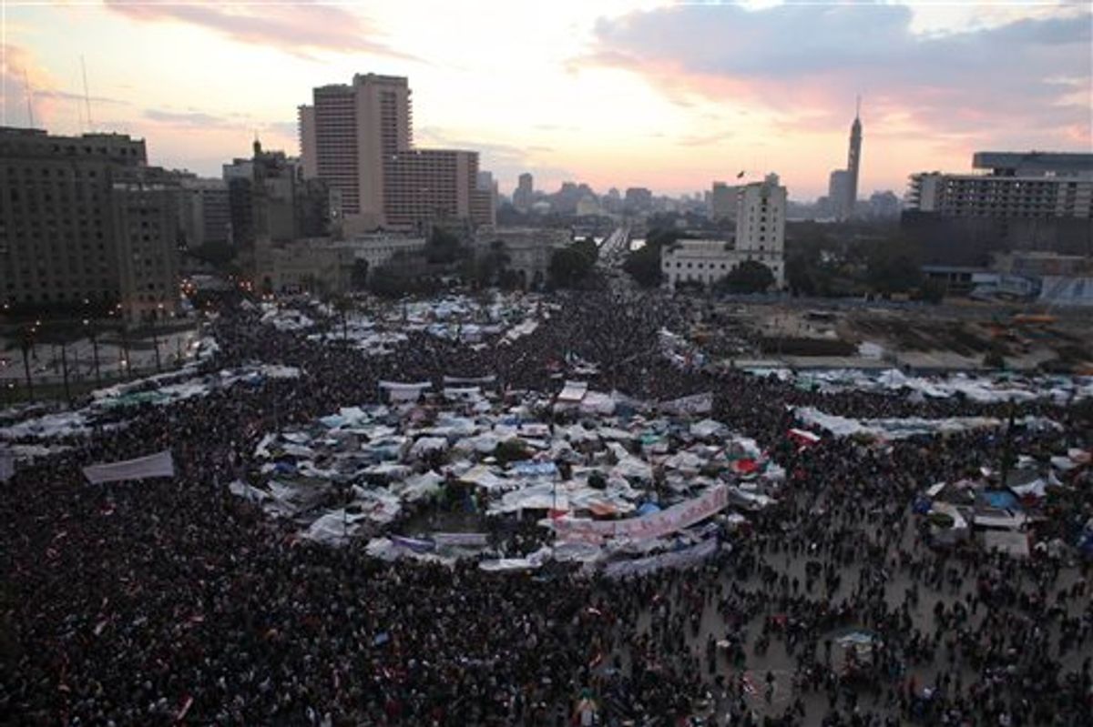 Anti-government protesters demonstrate in Tahrir Square in Cairo, Egypt, Thursday, Feb. 10, 2011. President Hosni Mubarak refused to step down or leave the country and instead handed his powers to his vice president Thursday, remaining president and ensuring regime control over the reform process, which stunned protesters demanding his ouster, who waved their shoes in contempt and shouted, "Leave, leave, leave." (AP Photo/Tara Todras-Whitehill) (AP)