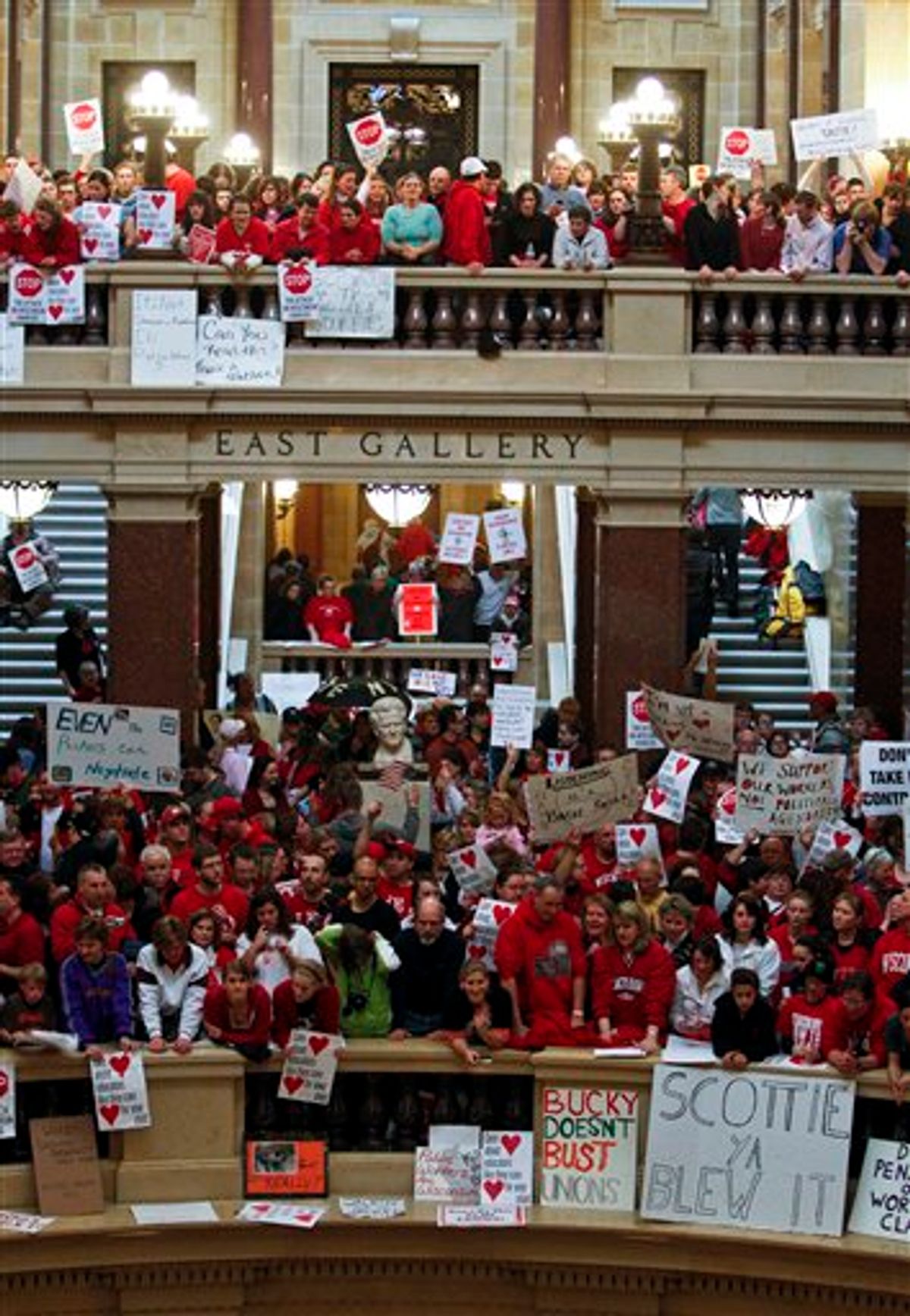 Protestors to Wisconsin Gov. Scott Walker's bill to eliminate collective bargaining rights for many state workers demonstrate in the rotunda at the State Capitol in Madison, Wis., Thursday, Feb. 17, 2011. (AP Photo/Andy Manis) (AP)