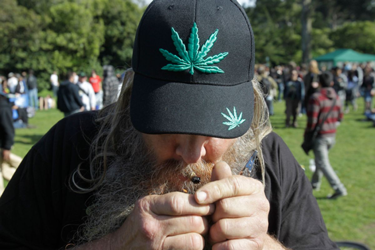 A man smokes marijuana at Golden Gate Park in San Francisco, Tuesday, April 20, 2010. Marijuana legalization advocates lit up across the country during the annual observance of 4/20, the celebration-cum-mass civil disobedience derived from "420" - insider shorthand for cannabis consumption. (AP Photo/Marcio Jose Sanchez) (Marcio Jose Sanchez)
