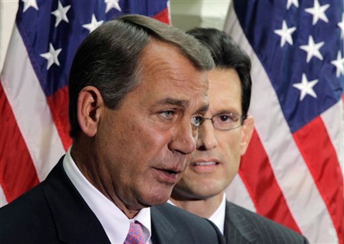 House Speaker John Boehner of Ohio, accompanied by House Majority Leader Eric Cantor of Va.  (AP/Charles Dharapak)