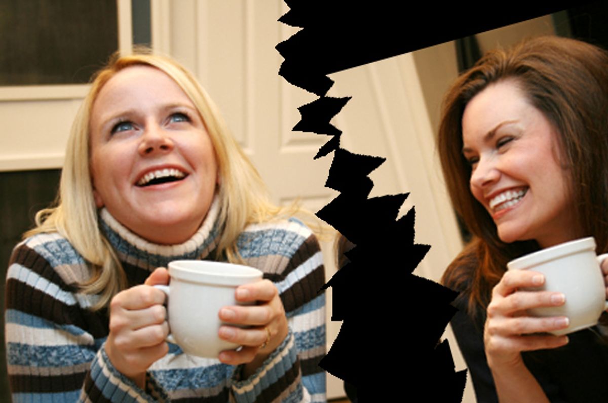 Friends enjoy a hot cup of coffee in the kitchen