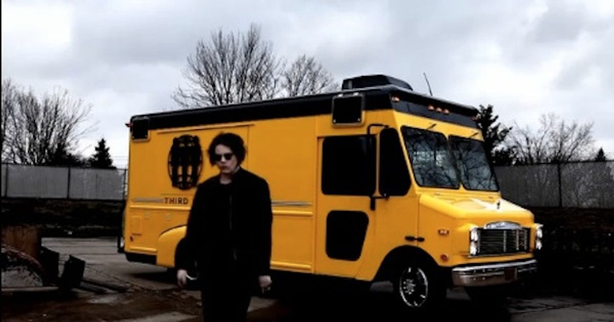 A man and his yellow van.