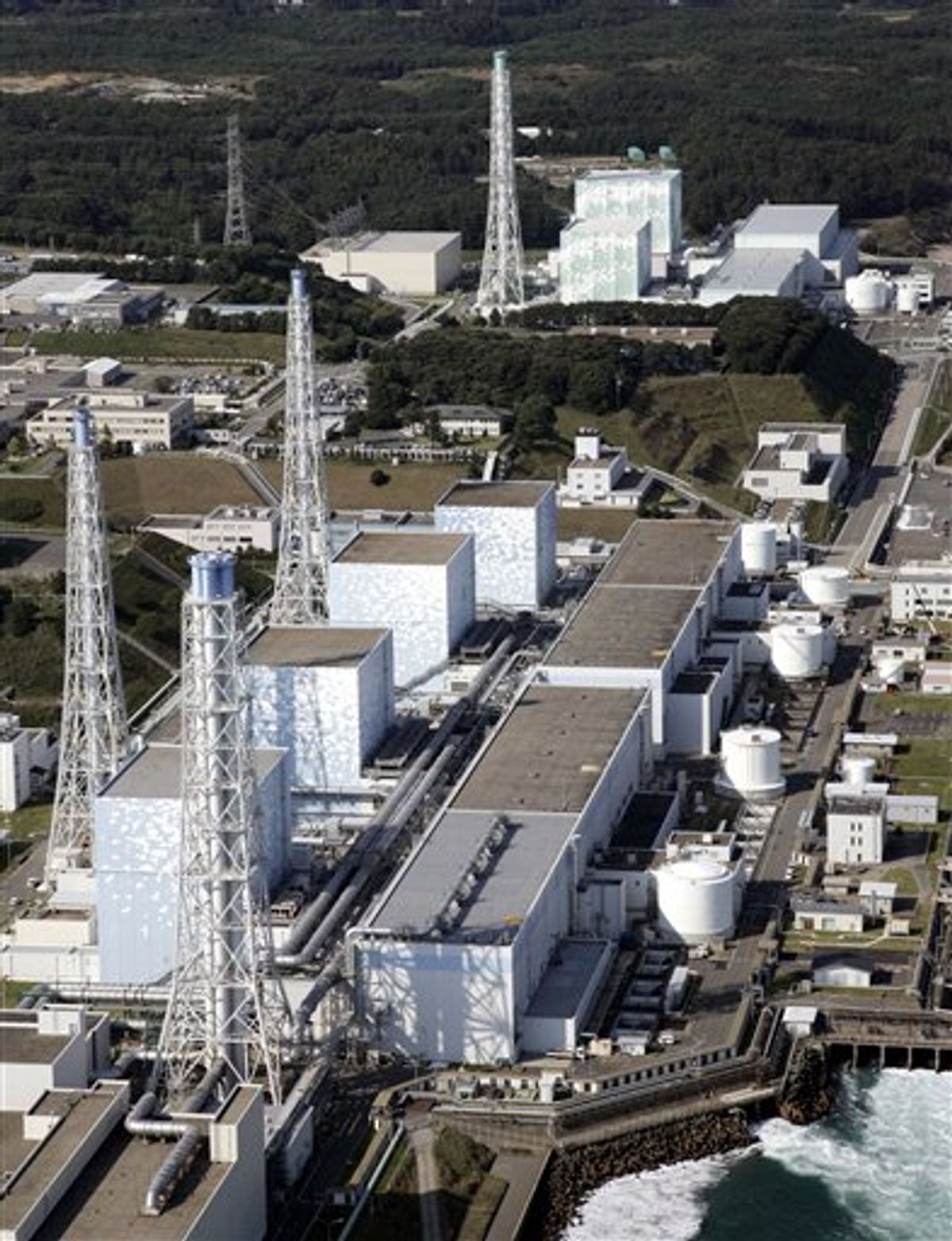 In this Oct. 3, 2008 photo, six reactors of the Fukushima Daiichi Nuclear Power Plant stand in line intact in Okumamachi in Fukushima Prefecture (state), northeastern Japan. Reactors, from bottom left, are: Unit 4, Unit 3, Unit 2, Unit 1, Unit 5 and Unit 6, top. (AP Photo/Kyodo News)  JAPAN OUT, MANDATORY CREDIT, NO LICENSING ALLOWED IN CHINA, HONG  KONG, JAPAN, SOUTH KOREA AND FRANCE   (AP)