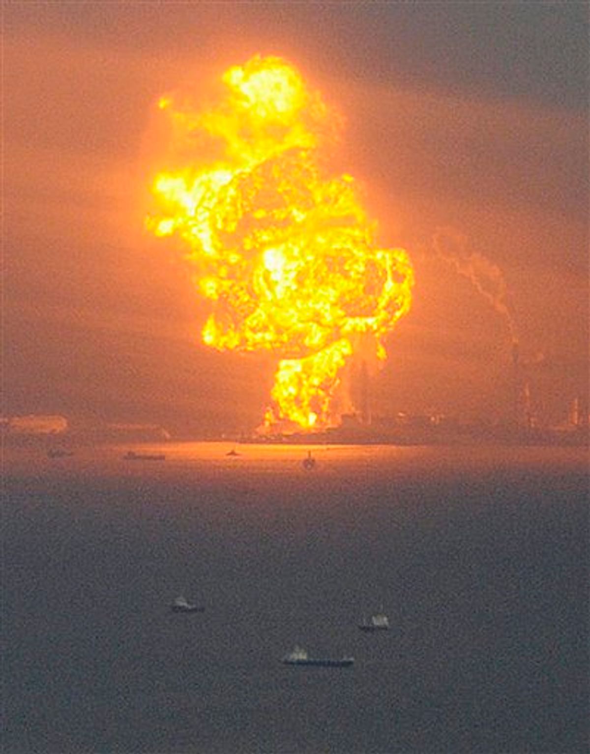 Flames rise from an oil refinery after a powerful earthquake in Ichihara, Chiba prefecture (state), Japan, Friday, March 11, 2011. The largest earthquake in Japan's recorded history slammed the eastern coast Friday. (AP Photo/Kyodo News) JAPAN OUT, MANDATORY CREDIT, FOR COMMERCIAL USE ONLY IN NORTH AMERICA (AP)