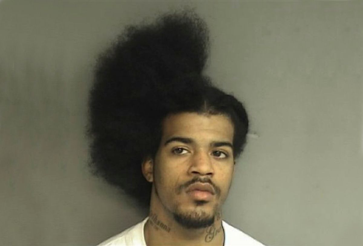 This Tuesday, March 8, 2011 booking photo released by the Stamford, Conn., Police shows David C. Davis, 21, of New Haven, Conn., who was arrested Tuesday and charged with slashing another man in the back while he was in the middle of a haircut.  (AP Photo/Stamford Police Department) (Anonymous)