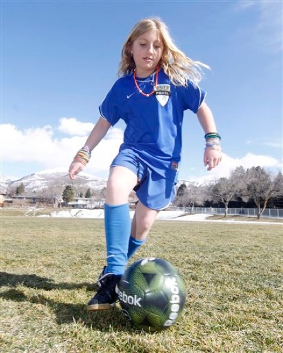 In this March 4, 20011 photo, Elizabeth Marston practices soccer at a school in Bountiful, Utah. Bradley Marston bought a genetic test online a year ago for his daughter Elizabeth, then 9, that showed she has an advantageous gene form for sports_ results her father hopes will help her get into elite sports programs or win a sports scholarship to college. (AP Photo/George Frey) (AP)