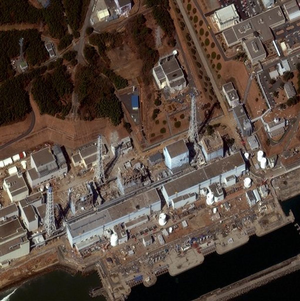 In this Friday, March 18, 2011 satellite image released by DigitalGlobe, the Fukushima Dai-ichi is shown.  Sirens wailed Friday along a devastated coastline to mark exactly one week since an earthquake and tsunami triggered a nuclear emergency, and the government acknowledged it was slow to respond to the disasters that the prime minister called a "great test for the Japanese people." The admission came as Japan welcomed U.S. help in stabilizing its overheated, radiation-leaking Fukushima Dai-ichi nuclear complex and raised the accident level for the crisis, putting it on a par with the 1979 Three Mile Island accident in Pennsylvania. (AP Photo/DigitalGlobe) NO SALES (AP)