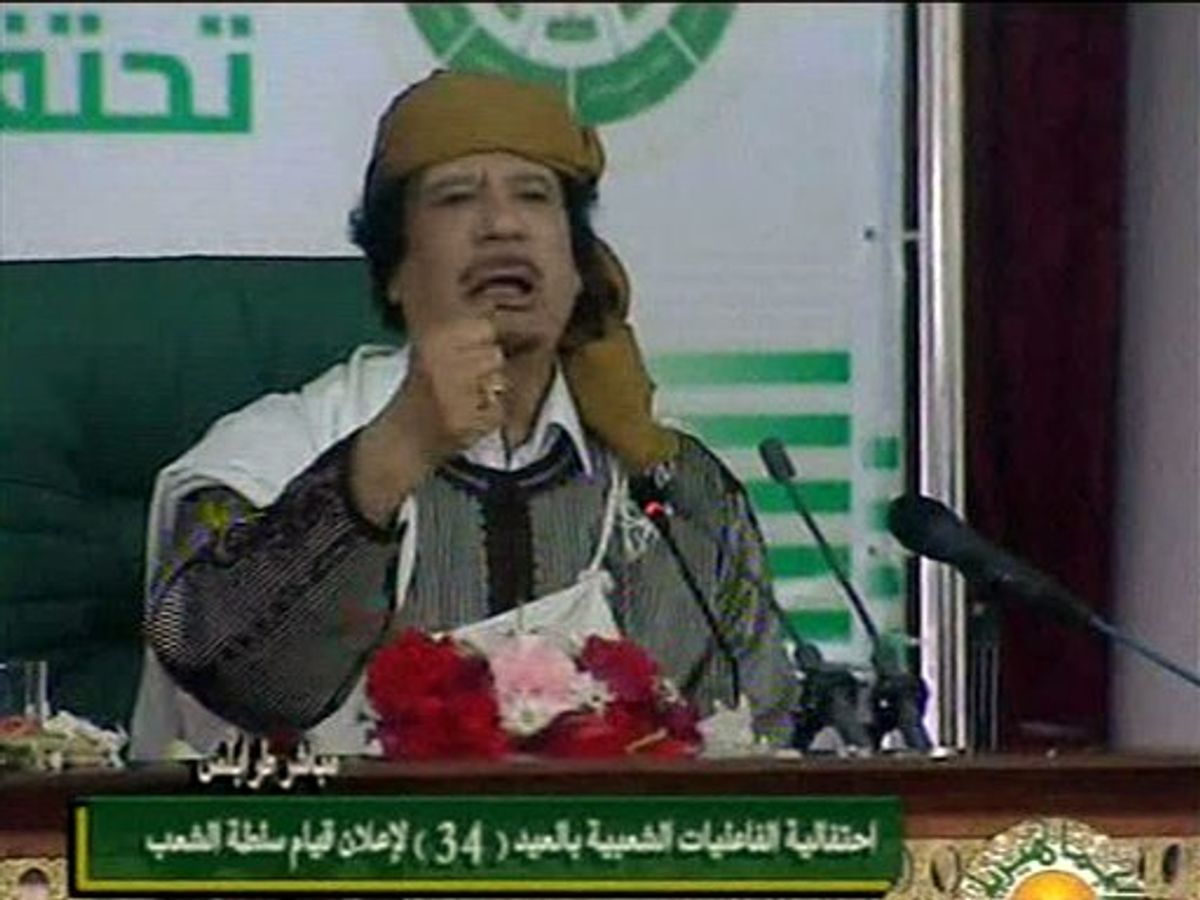 This video image taken from Libyan state television broadcast Wednesday March 2, 2011 shows Libyan leader Moammar Gadhafi addressing supporters and journalists in Tripoli, Libya. (AP Photo/Libyan state television via APTN)   LIBYA OUT, TV OUT (AP)