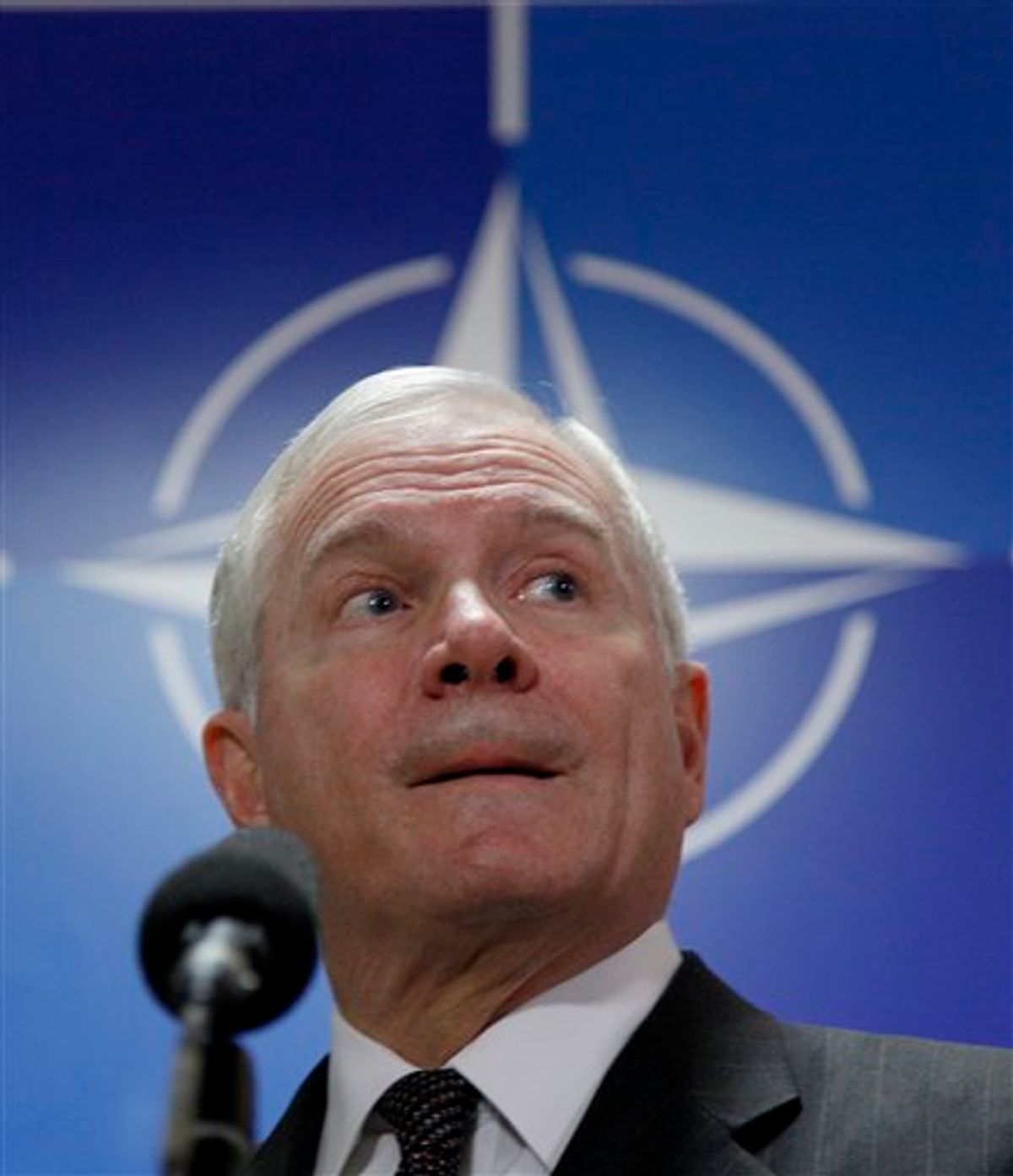 U.S. Defense Secretary Robert Gates speaks with the media after a meeting of NATO defense ministers at NATO headquarters on Thursday, March 10, 2011. NATO says it has started round-the-clock surveillance of the air space over Libya, where government jets have been pounding rebel positions in an effort to defeat an uprising. (AP Photo/Virginia Mayo) (AP)