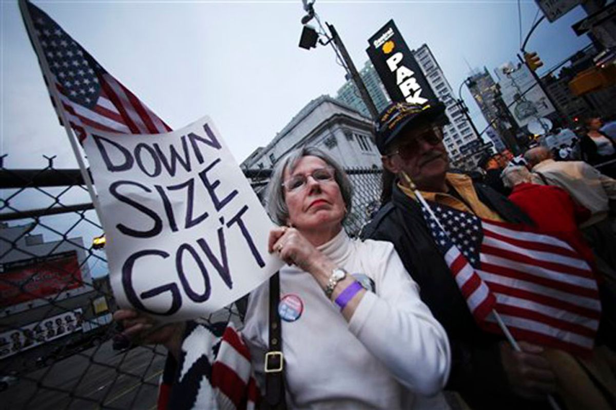 A couple participate in the Tax Day tea protest in New York, Thursday, April 15, 2010.  (AP Photo/Mary Altaffer)    (Mary Altaffer)