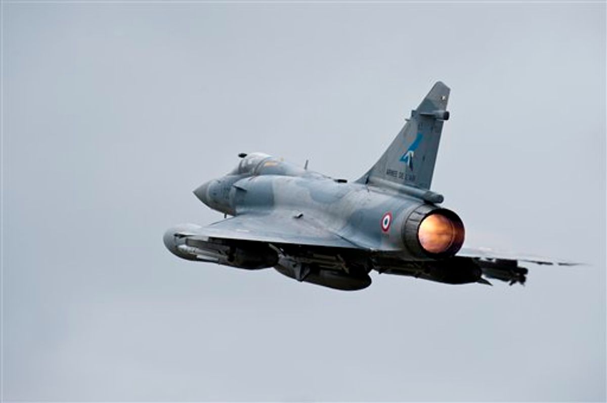 This photo provided by the French Army shows French Mirage 2000 jet fighter taking off for Libya at the military base of Dijon, central France, Saturday, March 19, 2011. Top officials from the United States, Europe and the Arab world have launched immediate military action to protect civilians as Libyan leader Moammar Gadhafi's forces attacked the heart of the country's rebel uprising. The Mirages 2000 are operating in Libya. (AP Photo/ Anthony Jeuland; SIRPA AIR) NO SALES (AP)
