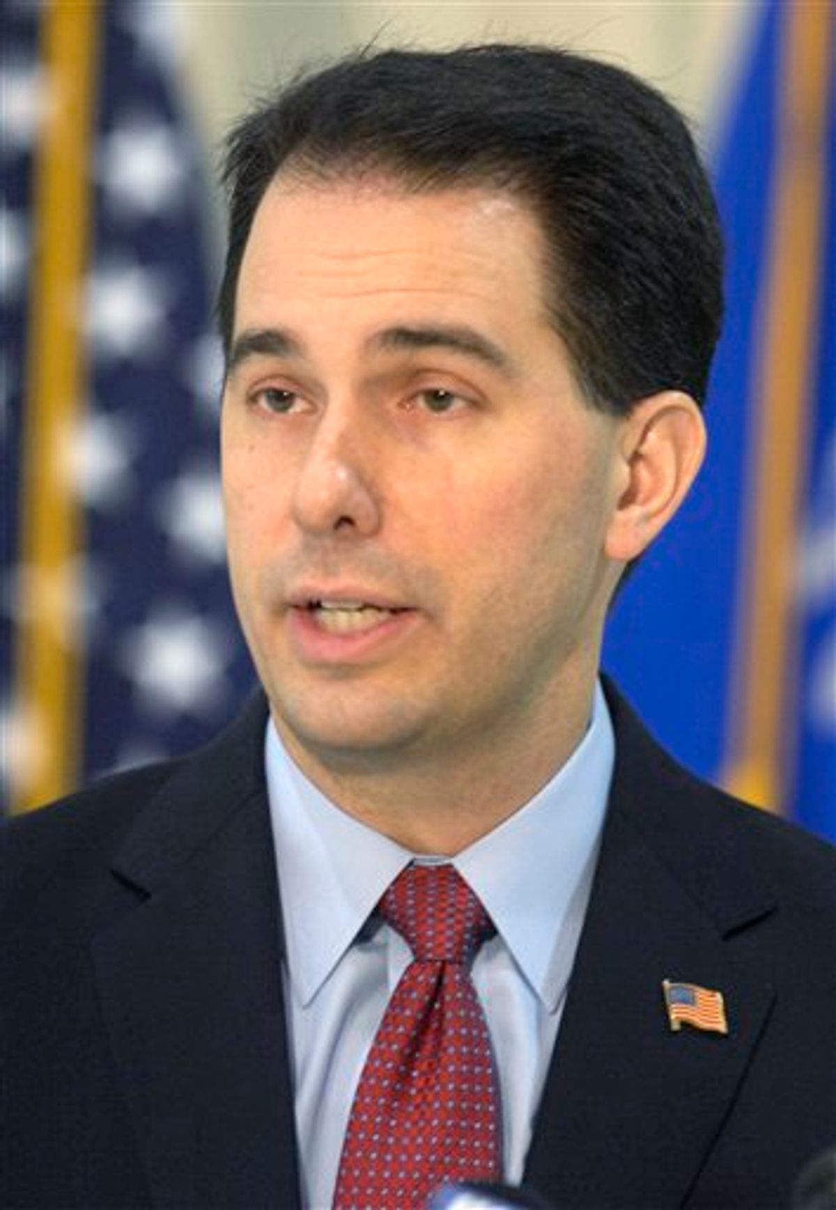 Gov. Scott Walker discusses his budget repair bill during a news conference at the Kenosha Airport in Kenosha, Wis., Friday, Feb. 25, 2011. Walker called on the missing Democratic state senators, including Kenosha's Robert Wirch, to return to the Capitol. (AP Photo/The Journal Times, Mark Hertzberg)  (AP)