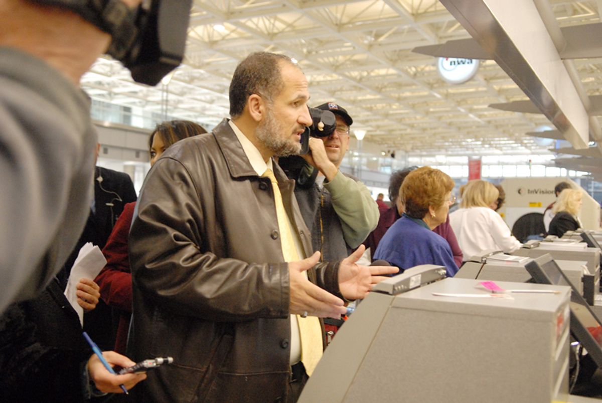 Omar Shahin, one of six imams removed from a US Airways flight at the Minnepolis-St. Paul International Airport, waits at the Northwest counter, where he successfully purchased a ticket on Nov. 21, 2006. 