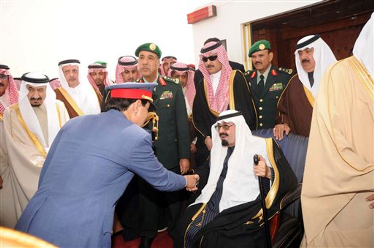 In this photo released by Saudi Press Agency, King Abdullah of Saudi Arabia, right is welcomed by Saudi officials, upon his arrival at King Khaled airport in Riyadh, Saudi Arabia, Wednesday, Feb. 23, 2011. King Abdullah has returned after an absence of three months, after surgery on his back in New York and convalescencing  in Morocco. (AP Photo) EDITORIAL USE ONLY, NO SALES (AP)
