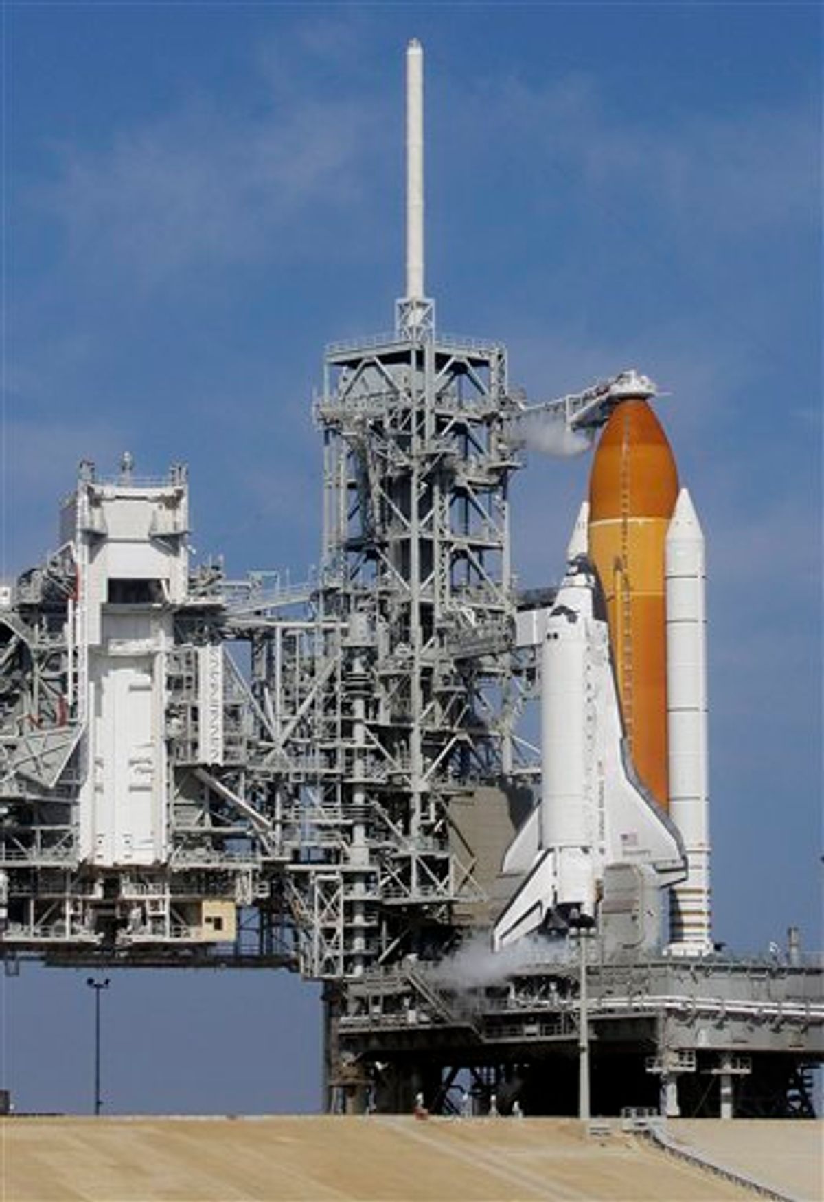 Fuel is loaded into the space shuttle Discovery as she sits on the launch pad at the Kennedy Space Center in Cape Canaveral, Fla., Thursday, Feb. 24, 2011. Discovery and her crew of six astronauts are scheduled to lift off this afternoon on an 11-day mission to the international space station. (AP Photo/John Raoux)  (AP)