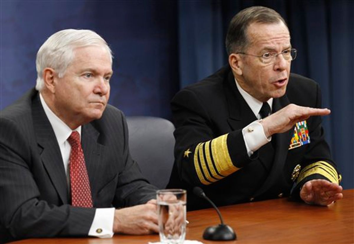 Defense Secretary Robert Gates, left, and Joint Chiefs Chairman Adm. Mike Mullen take part in a news conference at the Pentagon, Tuesday, March 1, 2011. (AP Photo/Alex Brandon) (AP)