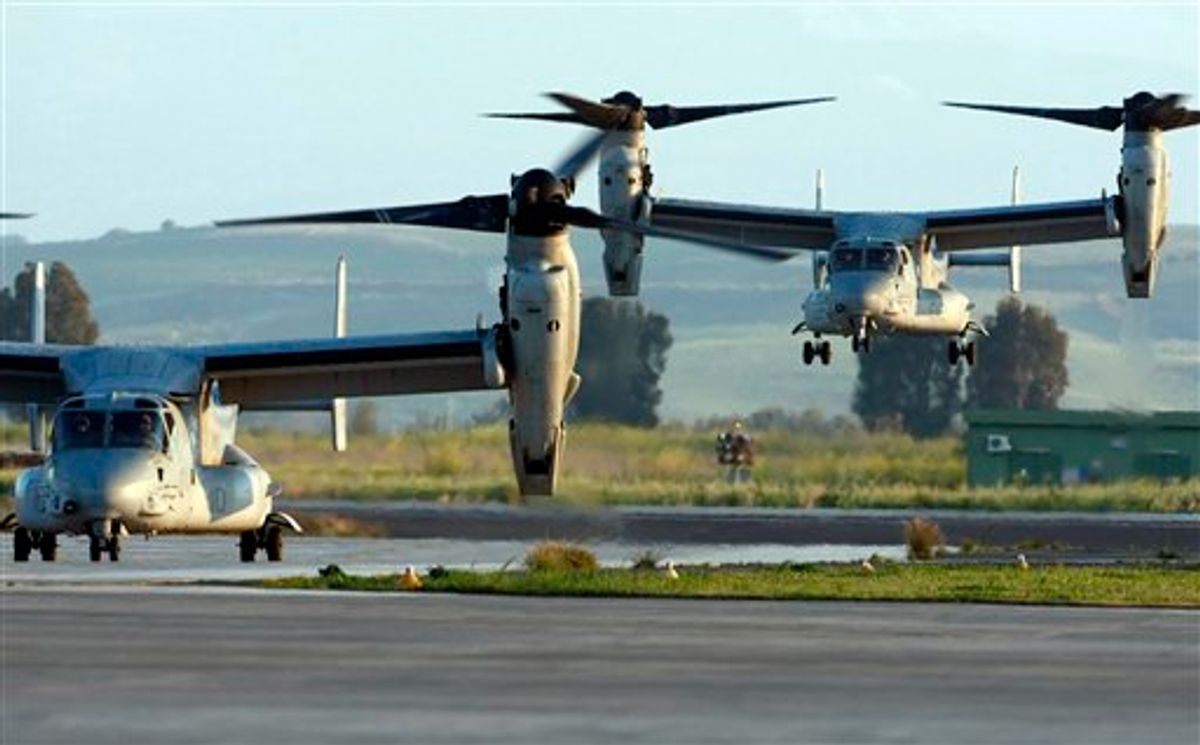 Two MV-22 Osprey vertical take off and lift aircraft  land , one carrying  US General Carter Ham ,  Commander of the United States military mission in Libya, in the Sigonella airbase, Sicily, Thursday, March 24, 2011. (AP Photo/Andrew Medichini) (AP)