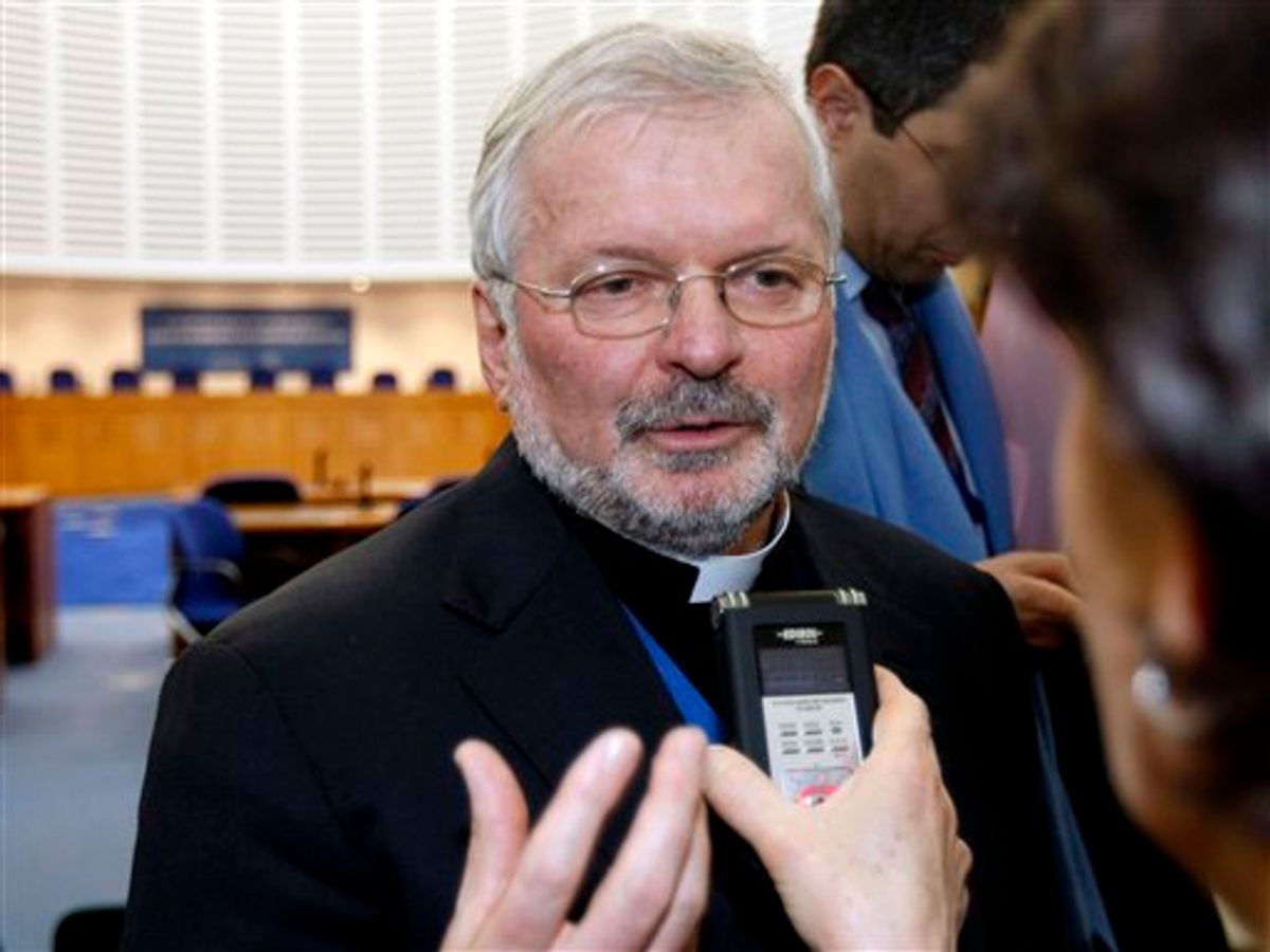 Bishop Aldo Giodano, permanent observer for the Vatican at the Council of Europe, answers questions of journalists at the European Court of Human Rights in Strasbourg, eastern France, Friday March 18, 2011. The European Court of Human Rights has ruled that crucifixes are acceptable in public school classrooms. The ruling will be binding on all 47 countries that are members of the Council of Europe, the continent's human rights watchdog. (AP Photo/Christian Lutz) (AP)