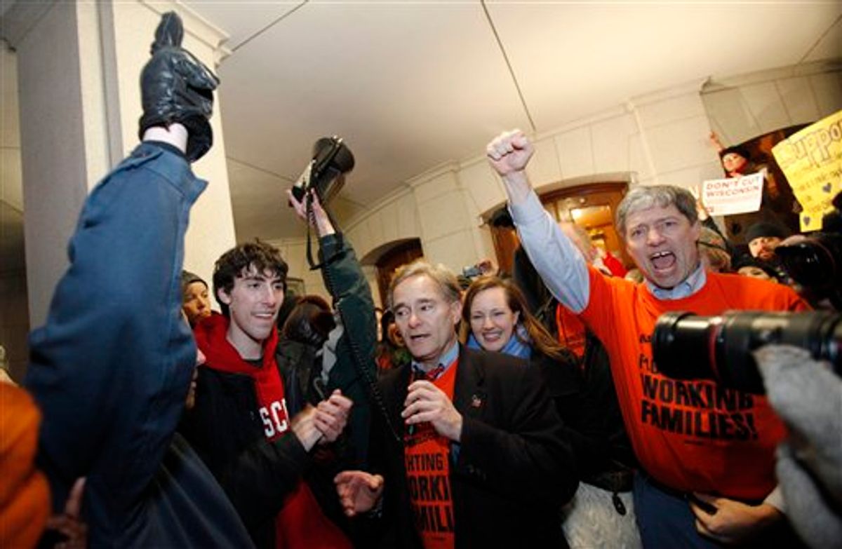 Wisconsin Minority Leader Peter Barca, D-Kensoha, celebrates with other law makers and protesters outside of the state Capitol in Madison, Wis., Thursday, March 3, 2011, after a judge ordered the Department of Administration to open the Capitol to normal business hours starting Monday, March 7, 2011.  (AP Photo/Andy Manis)    (AP)