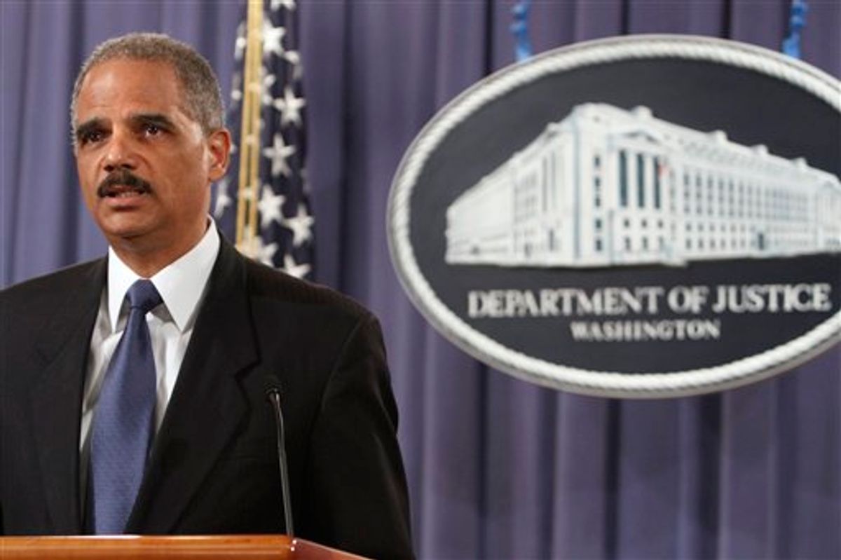 Attorney General Eric Holder speaks at a news conference at the Justice Department in Washington, Monday, April 4, 2011, where he announced plans to try avowed 9/11 mastermind Khalid Sheikh Mohammed and four alleged henchmen before a military commission.  (AP Photo/Jacquelyn Martin)        (AP)