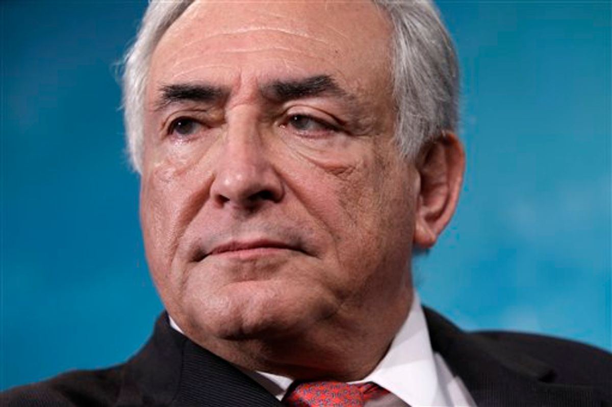 FILE - In this April 15, 2011, file photo International Monetary Fund Managing Director Dominique Strauss-Kahn attends the IMF/World Bank spring meetings in Washington. Strauss-Kahn, 62, seen as the strongest potential challenger to French President Nicolas Sarkozy in 2012 presidential elections, was pulled off a plane bound for Paris at New York's John F. Kennedy International Airport Saturday May 14, 2011, and subsequently arrested in connection with the violent sexual assault of a New York hotel maid. Political rivals expressed shock at his arrest. (AP Photo/J. Scott Applewhite, File) (AP)