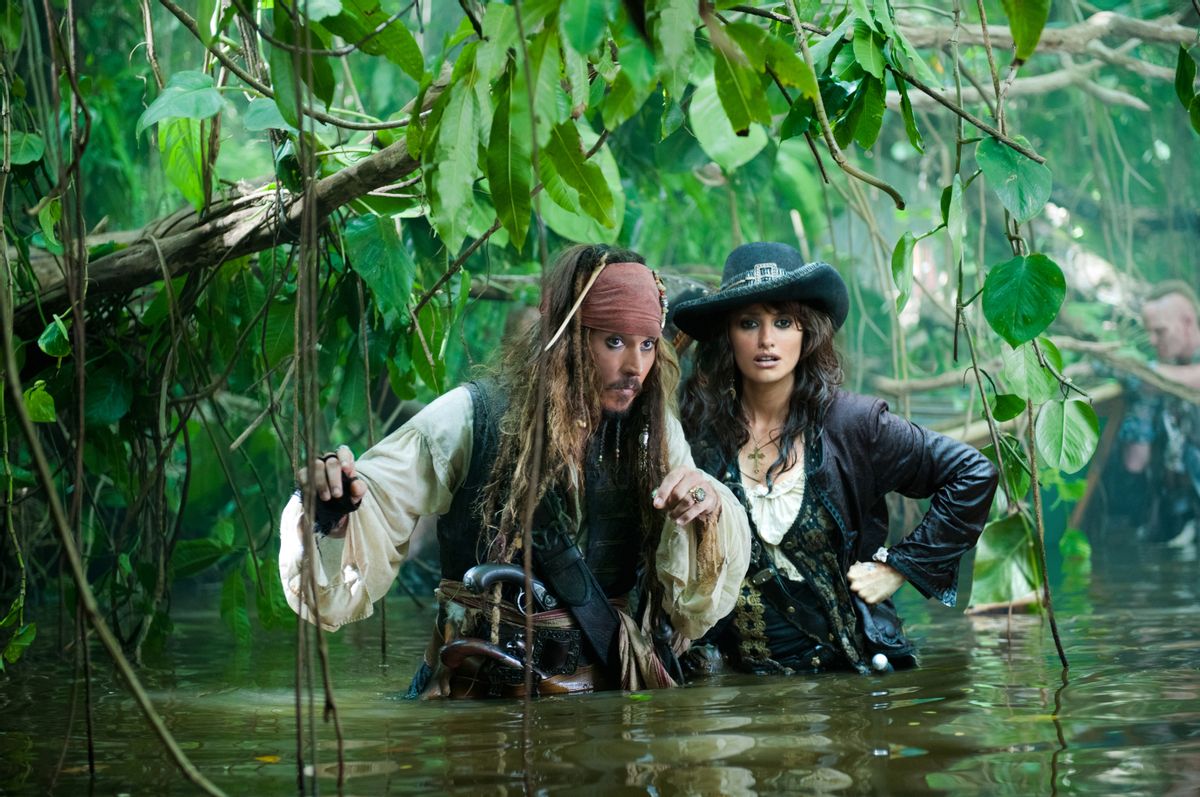 "PIRATES OF THE CARIBBEAN: ON STRANGER TIDES"

Captain Jack (JOHNNY DEPP) and Angelica (PENELOPE CRUZ) make their watery way through the jungle in search of the Fountain of Youth.

Ph: Peter Mountain

Â©Disney Enterprises, Inc.  All Rights Reserved.  (Peter Mountain)