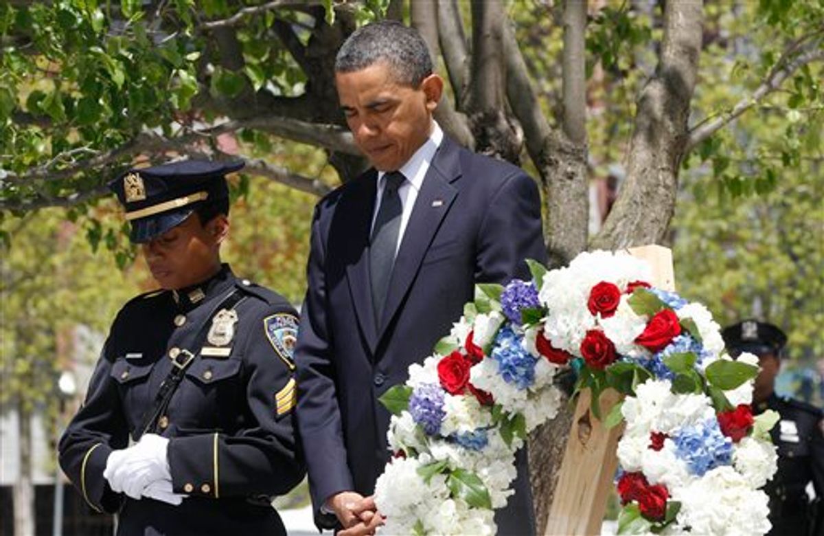 President Barack Obama pauses after laying a wreath at the National Sept. 11 Memorial at Ground Zero in New York, Thursday, May 5, 2011. (AP Photo/Charles Dharapak) (AP)