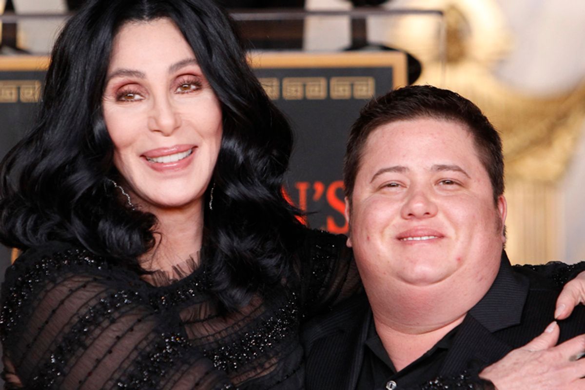 Cher poses with her son Chaz Bono during her hand and footprint ceremony in the forecourt of the Grauman's Chinese Theatre in Hollywood, California November 18, 2010. REUTERS/Danny Moloshok (UNITED STATES - Tags: ENTERTAINMENT)    (Danny Moloshok)